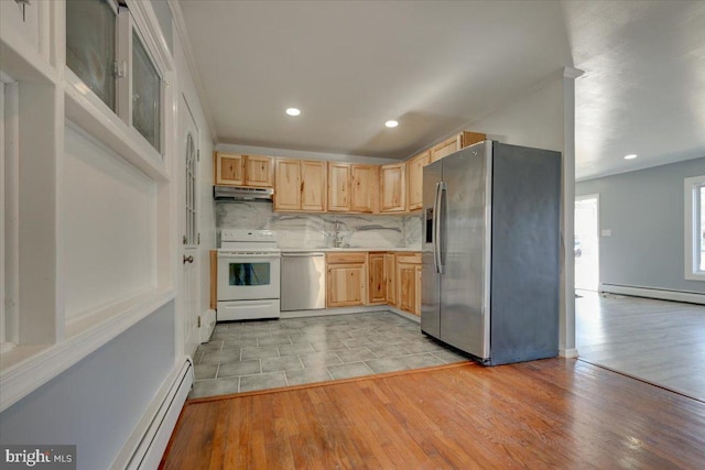 kitchen featuring tasteful backsplash, appliances with stainless steel finishes, light brown cabinets, and light hardwood / wood-style floors