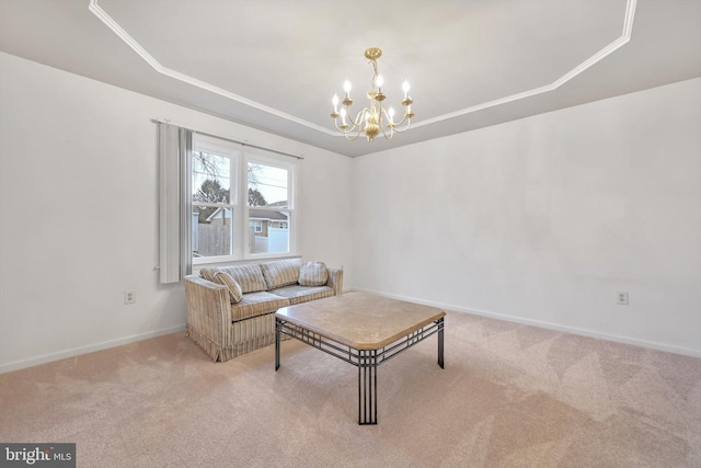 living room with carpet floors, a raised ceiling, and a notable chandelier