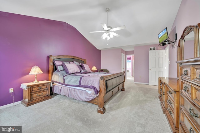 carpeted bedroom featuring ceiling fan and lofted ceiling