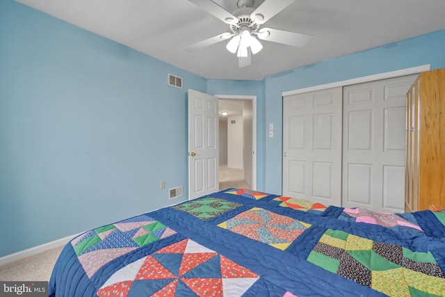 bedroom featuring ceiling fan, carpet, and a closet