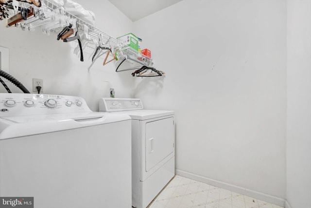 laundry room featuring independent washer and dryer