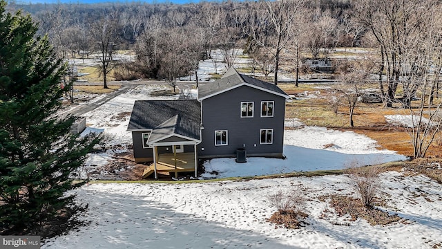 view of snow covered property