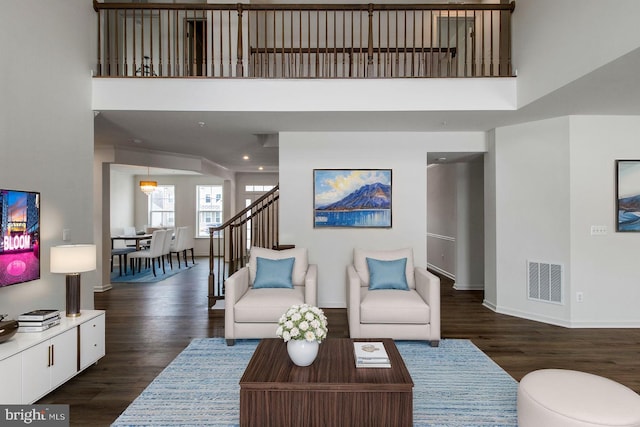 living room featuring dark hardwood / wood-style floors