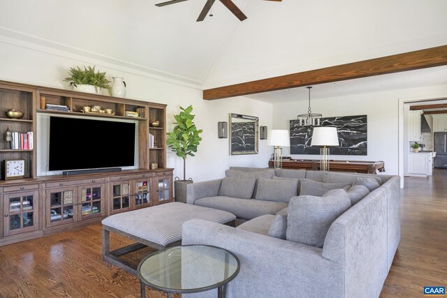 living room with lofted ceiling, dark wood-type flooring, and ceiling fan