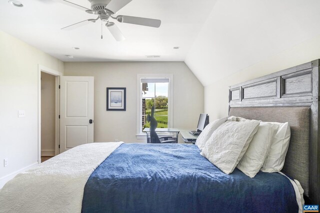 bedroom featuring lofted ceiling and ceiling fan