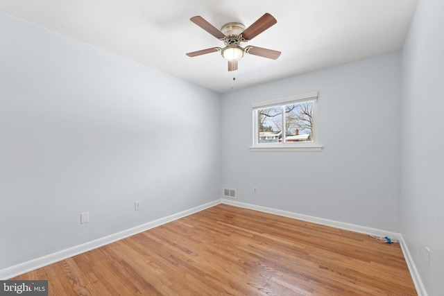 unfurnished room featuring ceiling fan and light hardwood / wood-style flooring