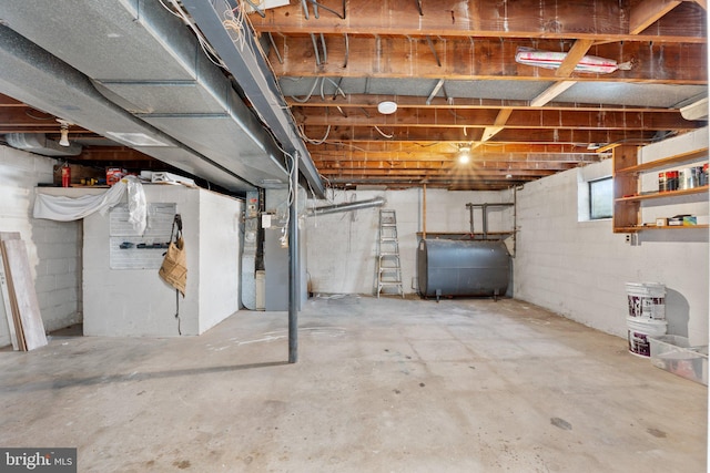 basement featuring heating unit