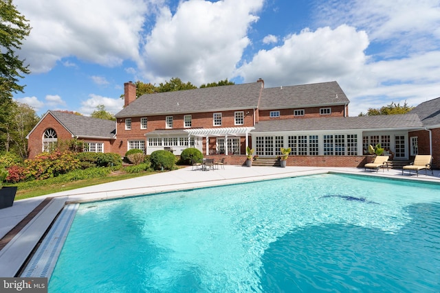 pool featuring a patio area