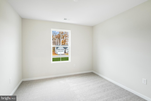 unfurnished room featuring carpet floors