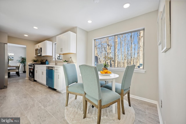 dining space with sink