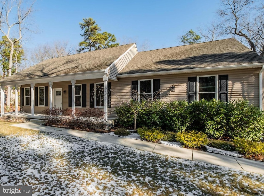 ranch-style home with covered porch