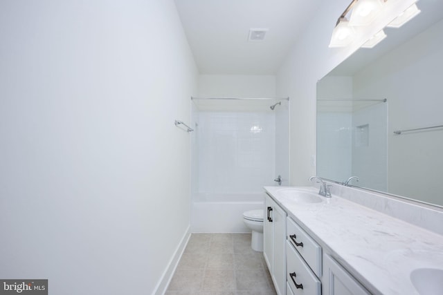 full bathroom featuring vanity, tiled shower / bath, tile patterned flooring, and toilet