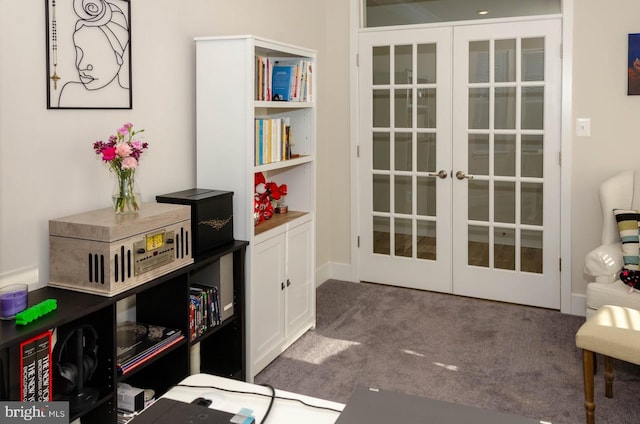 interior space with french doors and dark carpet