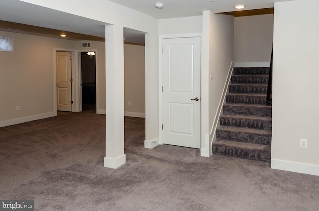 basement featuring carpet