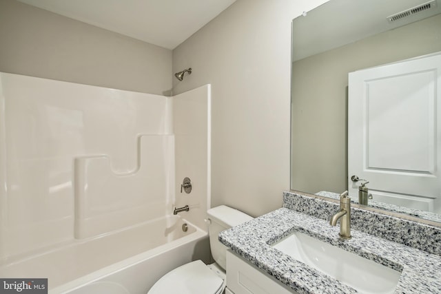 full bathroom featuring shower / bath combination, toilet, and vanity