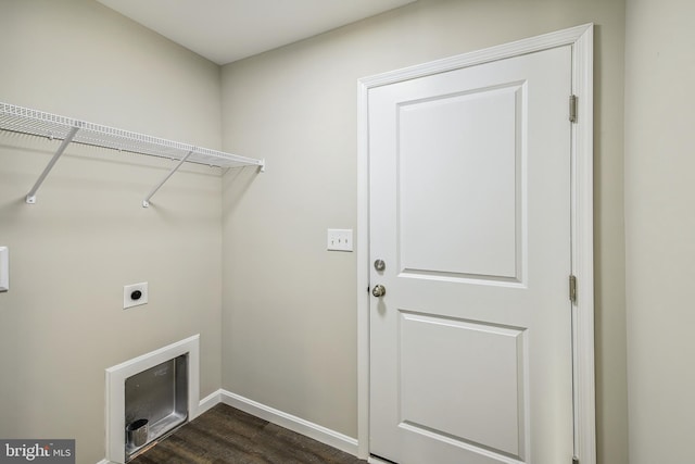 laundry area with dark wood-type flooring and hookup for an electric dryer