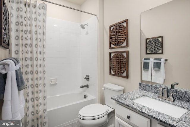 full bathroom with toilet, vanity, and shower / bath combination with curtain