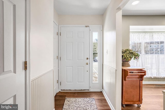 entrance foyer featuring dark wood-type flooring