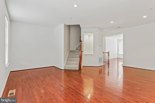 spare room with light wood-type flooring