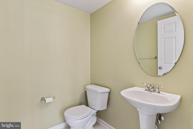 bathroom with sink and toilet