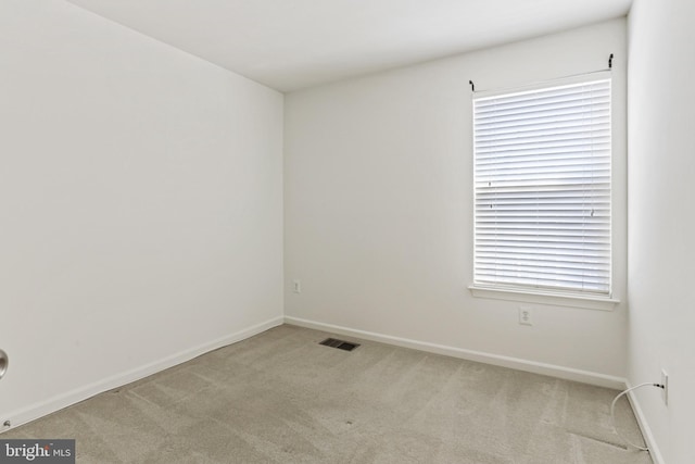 empty room with light carpet