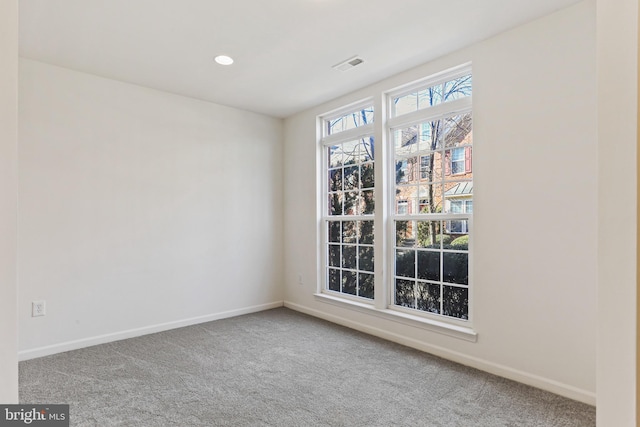 view of carpeted spare room