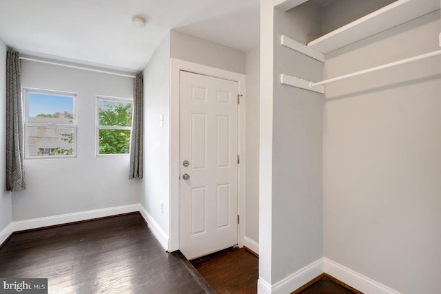 entrance foyer with dark hardwood / wood-style flooring