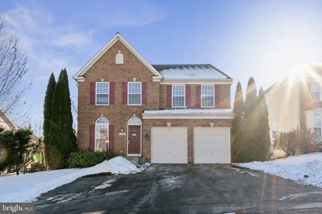 front of property featuring a garage