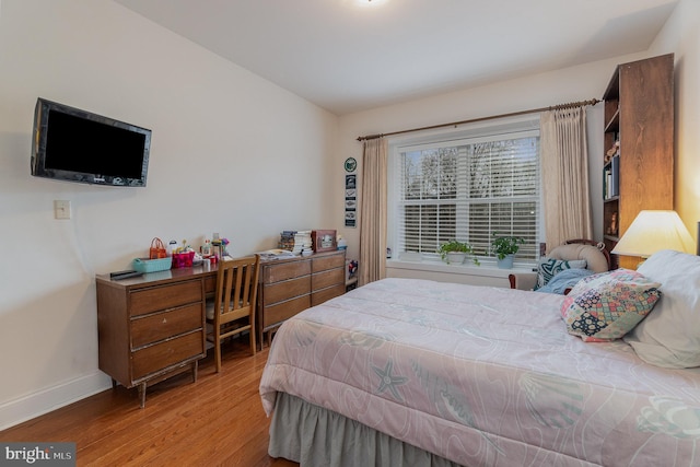 bedroom featuring light wood-type flooring