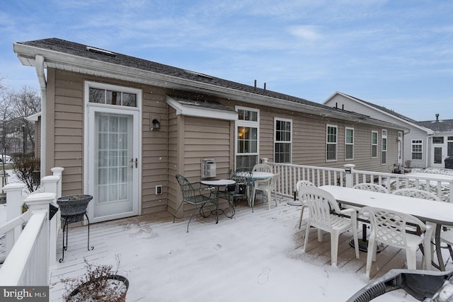 view of snow covered deck