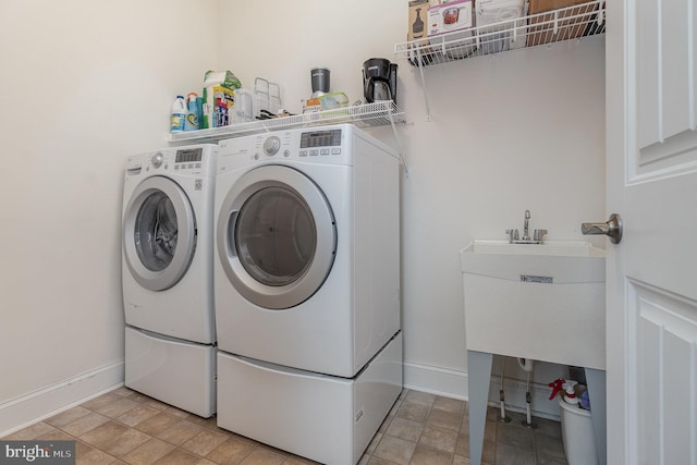 laundry area with washer and dryer