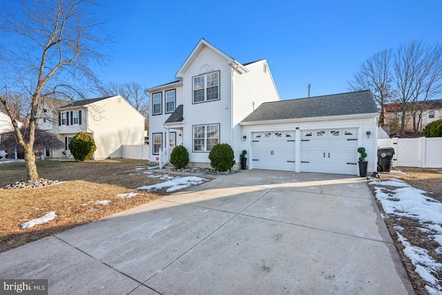 front of property featuring a garage