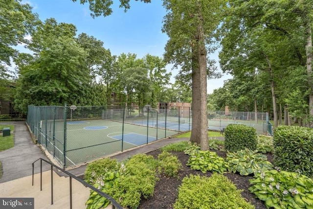 view of basketball court featuring tennis court