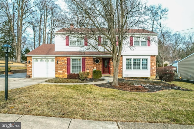 view of front of home with a garage and a front yard