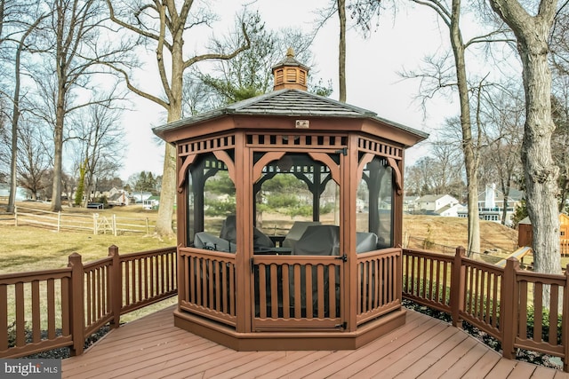 wooden deck with a gazebo