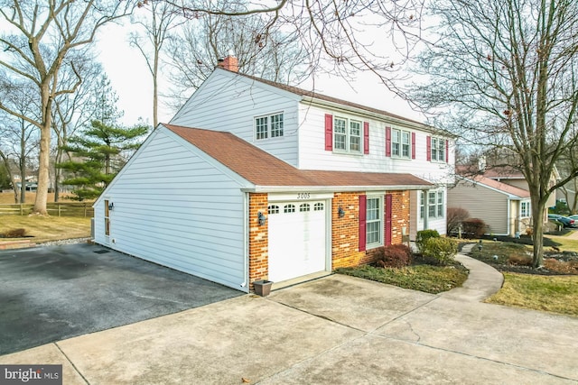 front of property featuring a garage