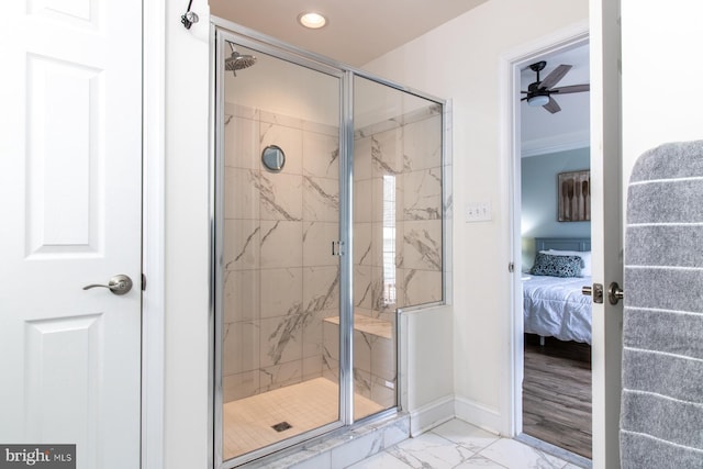 bathroom featuring walk in shower and ceiling fan