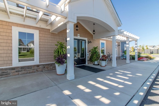 exterior space with a pergola and a patio area