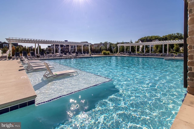 view of pool with a pergola