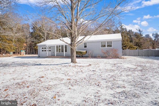 view of snow covered house