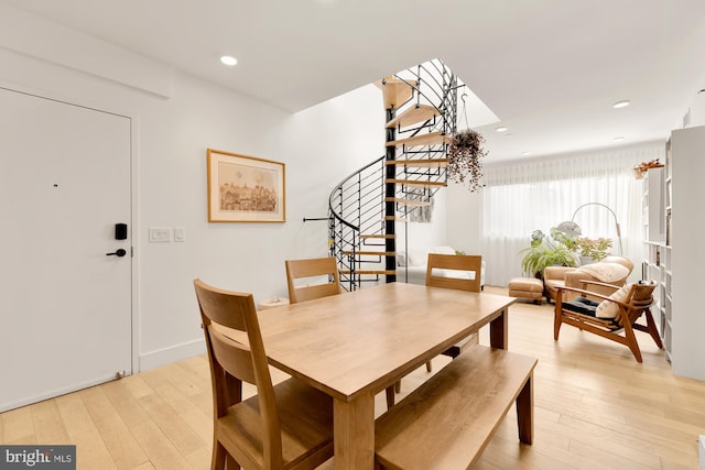 dining area with light hardwood / wood-style flooring