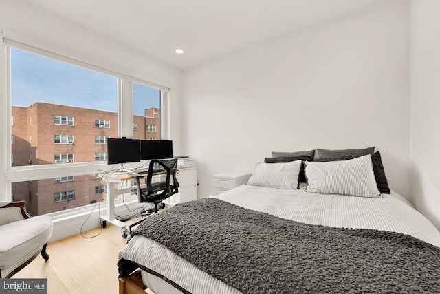 bedroom featuring wood-type flooring