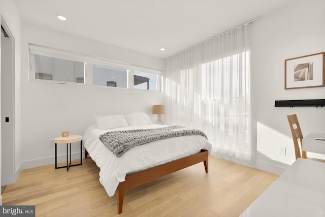 bedroom featuring light wood-type flooring