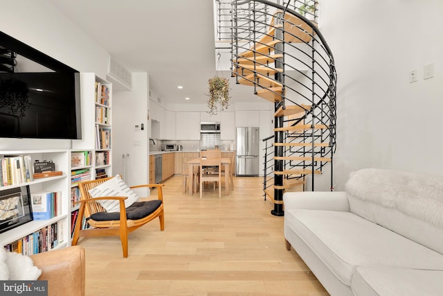 living room with light wood-type flooring