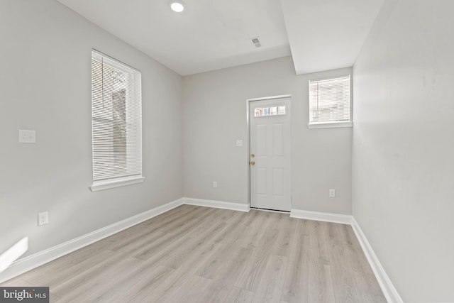 foyer entrance featuring light hardwood / wood-style flooring