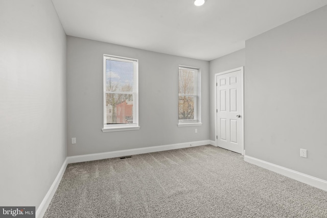 view of carpeted spare room