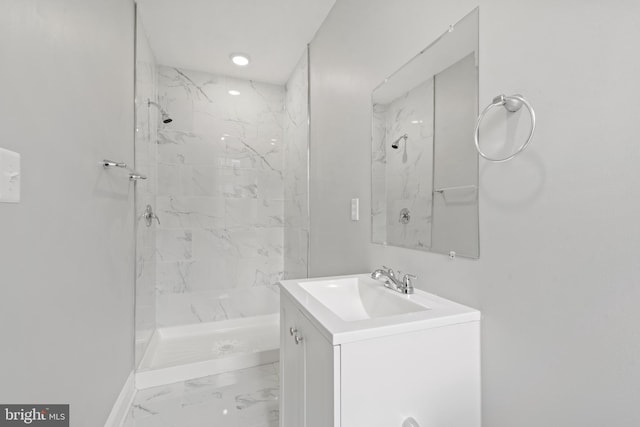 bathroom featuring vanity and walk in shower