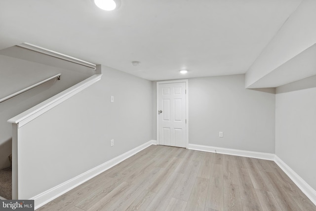 basement featuring light hardwood / wood-style floors