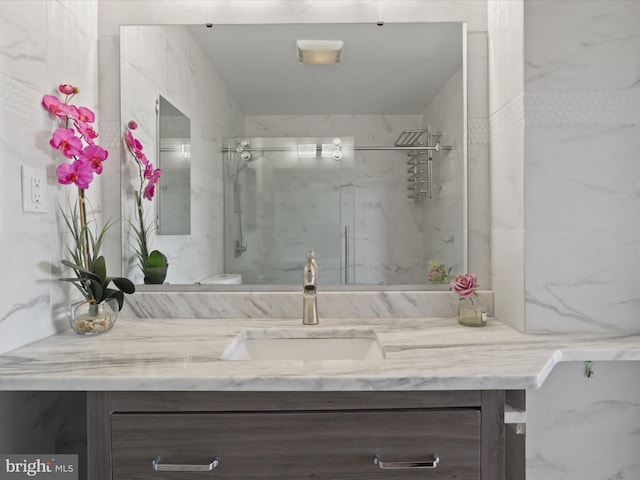 bathroom featuring vanity and walk in shower