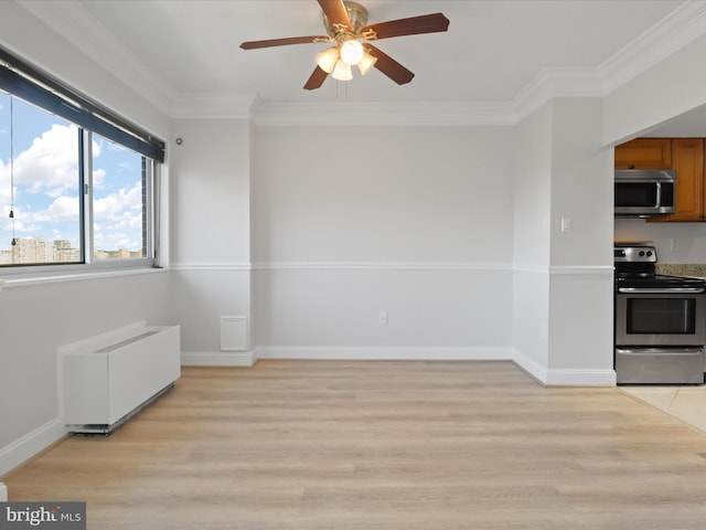 interior space featuring ceiling fan, ornamental molding, radiator, and light hardwood / wood-style floors